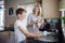 Mother and Son Doing the Dishes