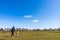 Mother and son flying kite in the Garry Point Park in springtime. Richmond, BC, Canada.