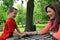 Mother and son having fun thumb wrestling