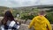 Mother and son looking out across the Yorkshire Moors and small town