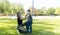 Mother with son at the playground  in face masks. People wears a protective medical masks during an epidemic coronary virus or flu