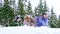 Mother and son playing with beagle dog in deep snow