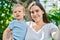 Mother and son smiling confident make selfie by camera at park