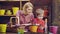 Mother and son taking care of plants. Happy family of mother and son planting flowers in pot.