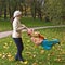 Mother spinning her daughter