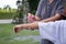 Mother spraying insect repellents on her son arm