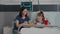 Mother standing with sick daughter while eating healthy food meal during lunch