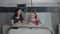 Mother standing with sick girl while eating healthy food meal during lunch waiting for medical expertise