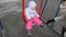 Mother swinging on the swing her happy 1 year child at Playground. Spring