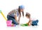 Mother teaches daughter child cleaning room