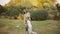 Mother teaches her little daughter to play badminton. Active Family Vacation.