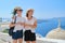 Mother and teenage daughter traveling together, luxury travel, island Santorini