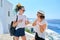 Mother and teenage daughter traveling together, luxury travel, island Santorini