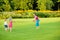 Mother throwing frisbee