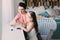 Mother and toddler daughter playing with plasticine or play dough at home