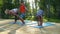 Mother and two boys doing stretching exercises