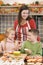 Mother and two children at Halloween making treats