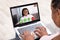 Mother Video Conferencing With Her Daughter On Laptop