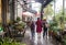 Mother walks her children home after school on a rainy Paris day