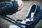 Mother walks with a stroller in the autumn park