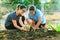 mother and young daughter planting vegetable in home garden field use for people family and single mom relax outdoor activities