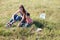 Mother and young son catch insects butterflies