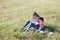 Mother and young son catch insects butterflies