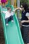 Motherhood Baby Sliding Down Slide