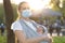 Motherhood, care, infants, summer, coronavirus and quarantine concept - Young beautiful mom with a newborn baby in a