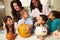 Mothers And Children Making Halloween Lanterns