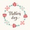 Mothers day greeting card, invitation. Handwritten brush script, lettering. Floral wreath. Stock