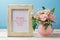 Mothers day greeting card with pink rose flower bouquet and photo frame