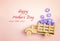 Mothers Day greeting message with wooden toy truck with violet f