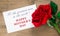 Mothers day message with red rose.