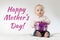 Mothers day. Serious baby boy holding some present in his arms. Thoughtful infant kid with a gift. Ready postcard
