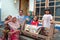 Mothers with their kids in front of their house in Lombok, Indonesia