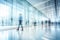 Motion blur of business people walking in the corridor of modern office