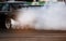 Motion blur of Car drifting, Blurred of image diffusion race drift car with lots of smoke from burning tires on speed track