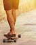 Motion blur of fast skateboarder feet moving