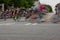 Motion Blur Of Male Cyclists Turning Corner In Amateur Race