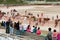 Motion Blur Of People Running With Bulls As Spectators Watch