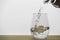 Motion blur of pouring pure drinking water flow into the glass  on wooden table
