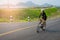 Motion blur woman riding bicycle