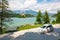 Motion blured white electric car in front of Bled lake, country of Slovenia. Travel, tourism, explore, rent a car