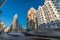 Motion blurred cars and people at Plaza de Callao subway station, Edificio Carrion Capitol building and Gran Via downtown Madrid