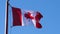 Motion of Canadian flag flying on flagpoles