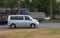 Motion grey blurred minibus