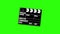 A motion picture clapboard, also called a slate on green screen. FullHD