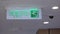 Motion of security cameras and exit sign on ceiling