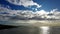 Motion time lapse with amazing sky over Rome beach at Ostia lido with city skyline and scenic daylight between mammatus cloud and